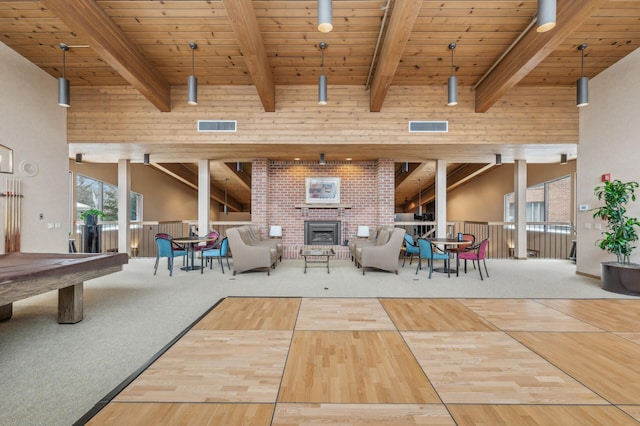 interior space with wood-type flooring, beam ceiling, and wooden ceiling