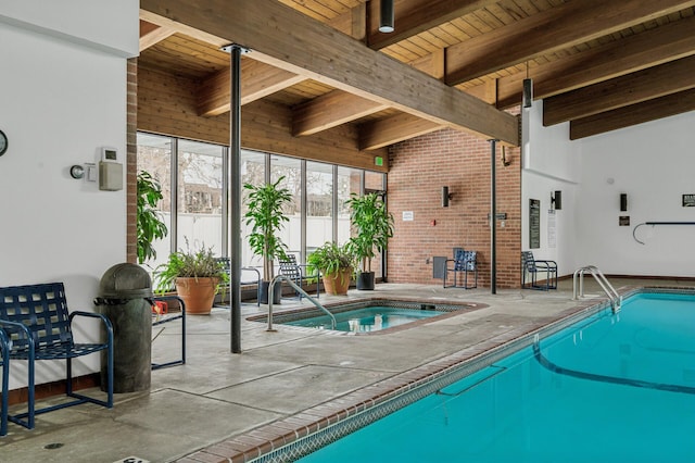 view of pool featuring sink and a patio area