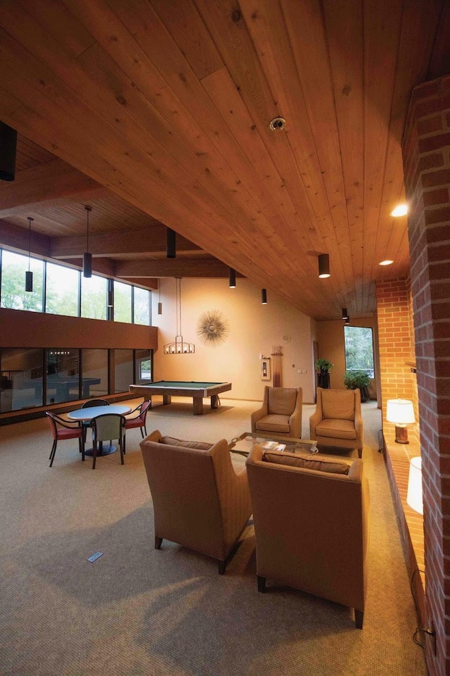 interior space with wood ceiling, pool table, and carpet