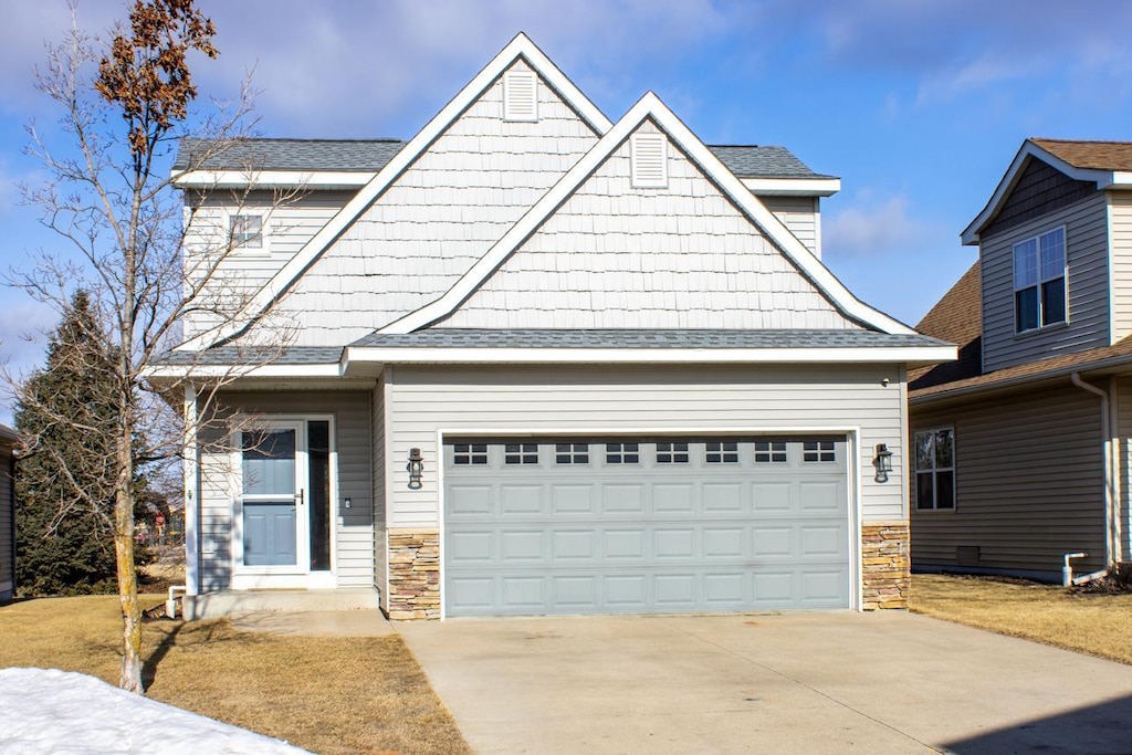 craftsman inspired home featuring a garage