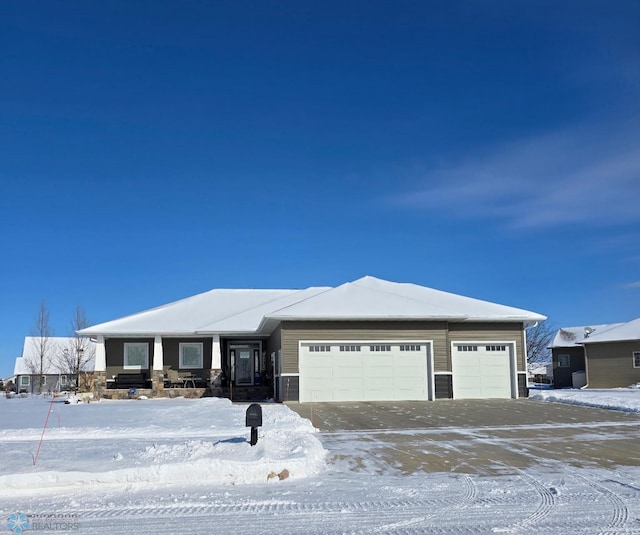 view of front of property featuring a garage