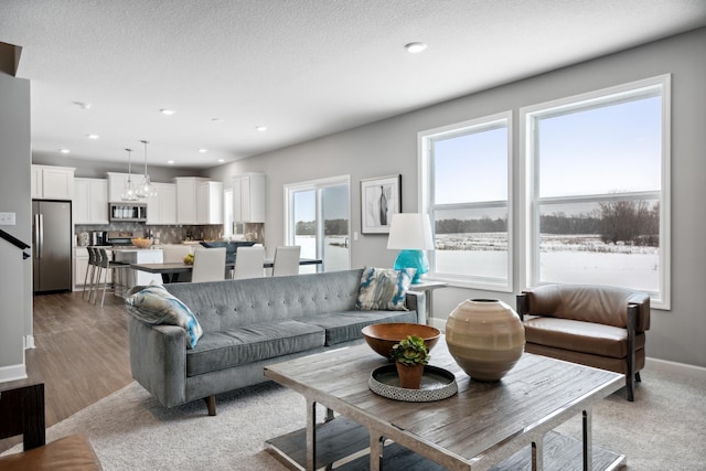 living room with light hardwood / wood-style floors