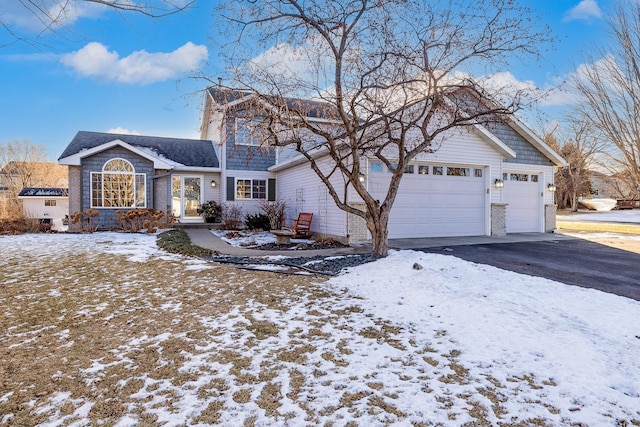 view of front of home with a garage