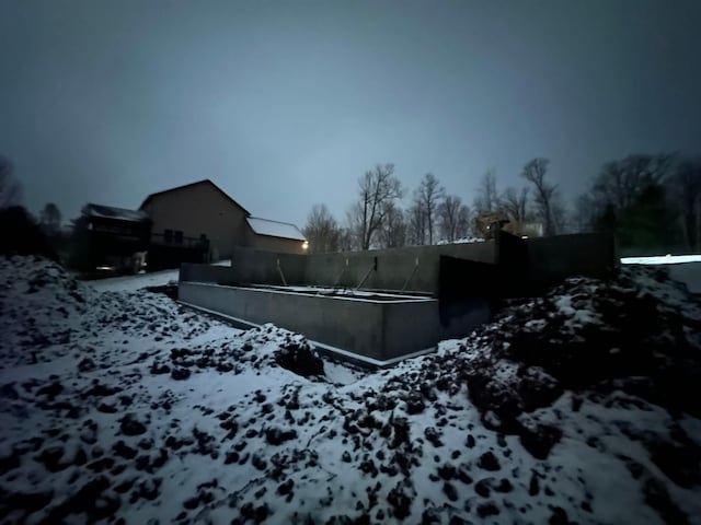 view of yard covered in snow