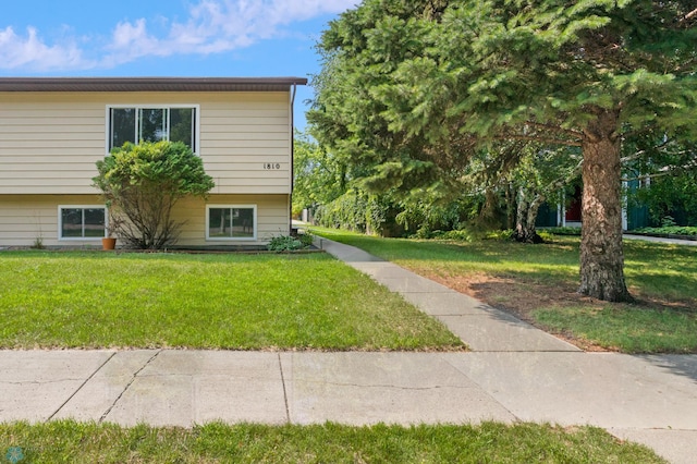 exterior space featuring a front lawn