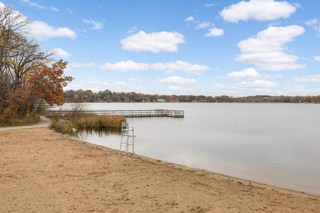 view of dock with a water view