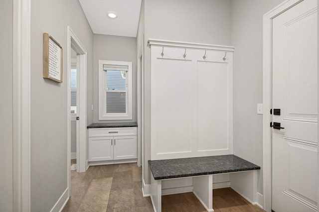 mudroom featuring baseboards