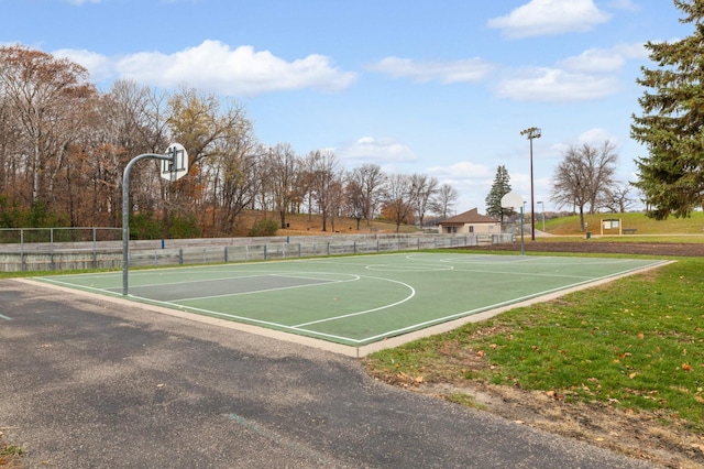 view of sport court with community basketball court and fence