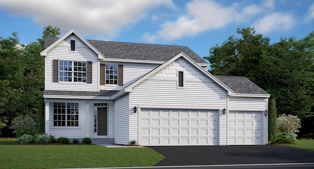 view of front of property with a garage and a front yard