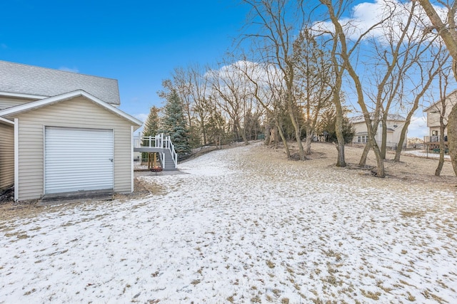 view of yard covered in snow