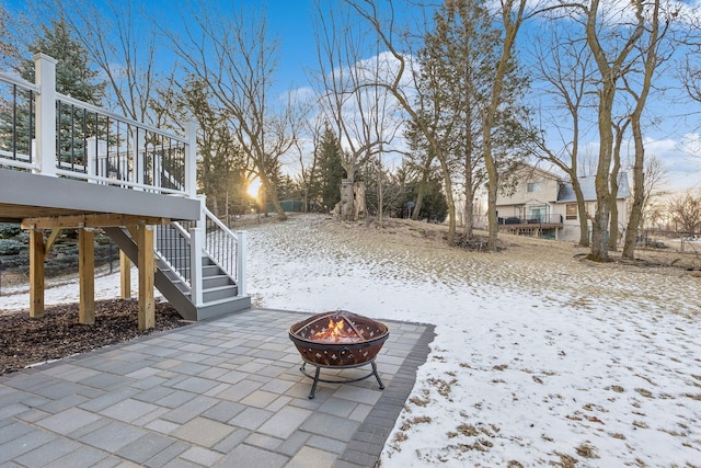 exterior space with a fire pit