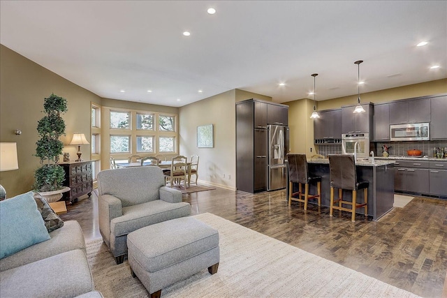 living room with dark wood-type flooring