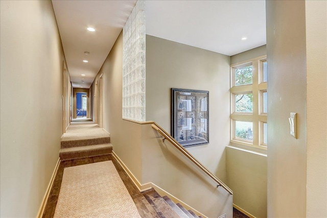 hall with dark wood-type flooring