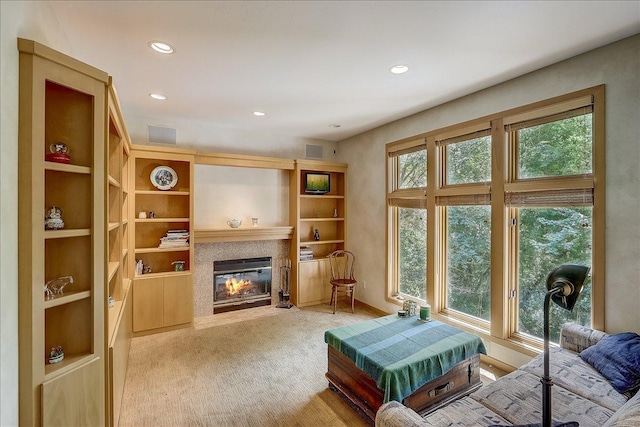 living room featuring light carpet