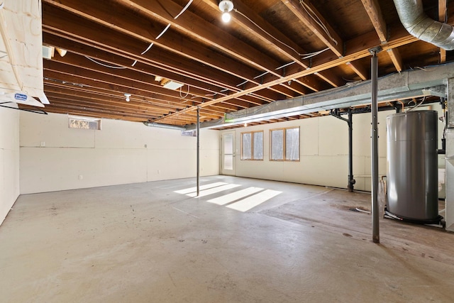 basement featuring water heater