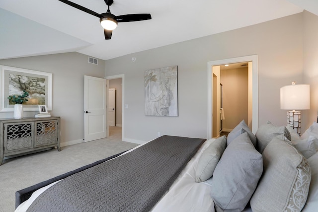 bedroom featuring light carpet, baseboards, lofted ceiling, and ceiling fan