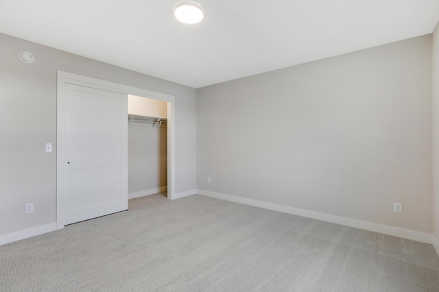 9568 63rd St S, Cottage Grove, MN 55016 - unfurnished bedroom with light colored carpet, baseboards, and a closet