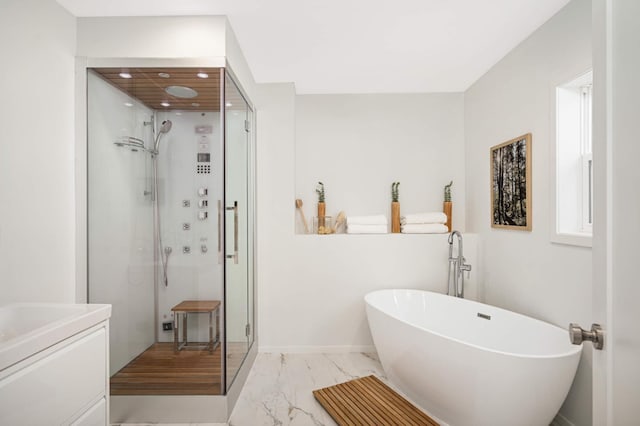 bathroom with shower with separate bathtub