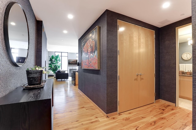 hall featuring light hardwood / wood-style floors