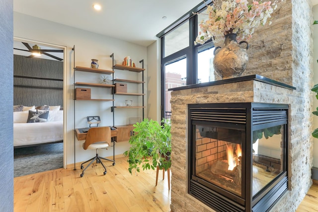 room details featuring hardwood / wood-style floors and a fireplace