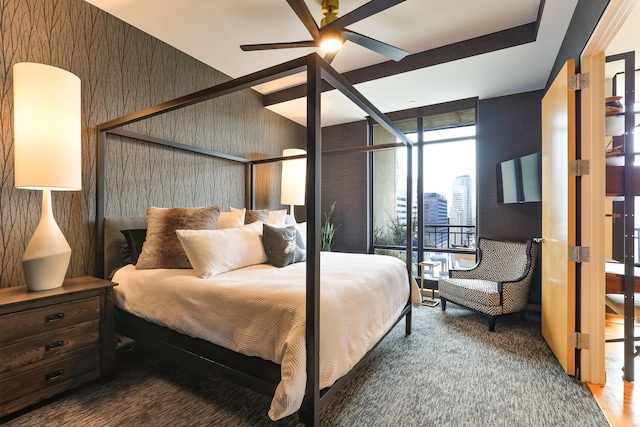 bedroom with floor to ceiling windows