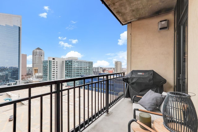 balcony featuring a grill