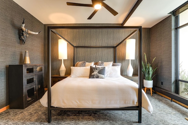 bedroom featuring multiple windows, carpet floors, and ceiling fan