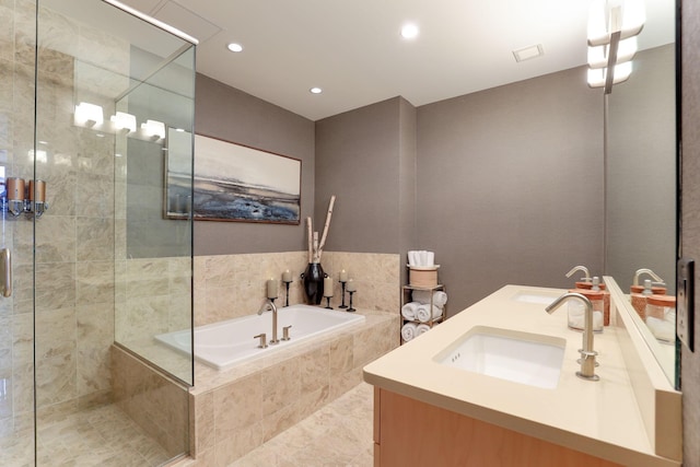 bathroom featuring vanity and plus walk in shower