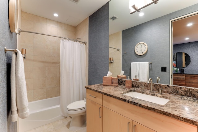 full bathroom featuring shower / bath combination with curtain, vanity, toilet, and tile patterned flooring