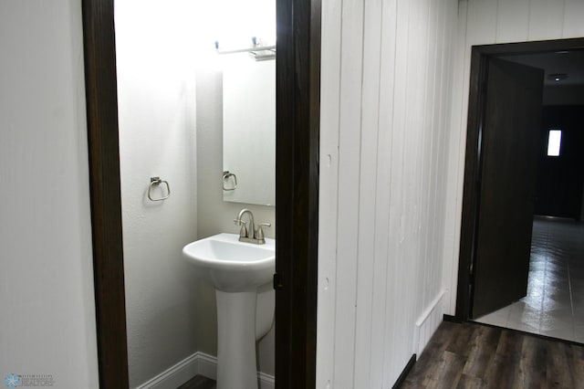 bathroom featuring sink and hardwood / wood-style flooring