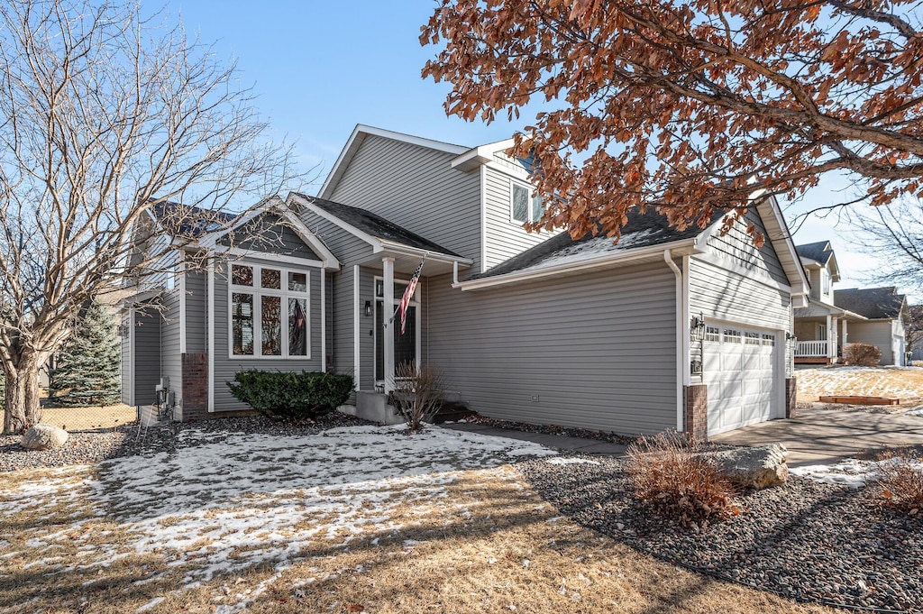 view of front of property featuring a garage