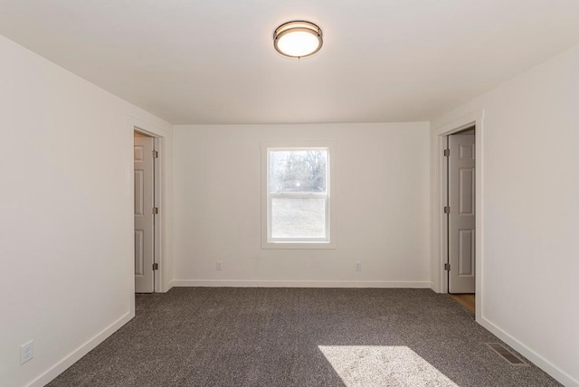 view of carpeted spare room