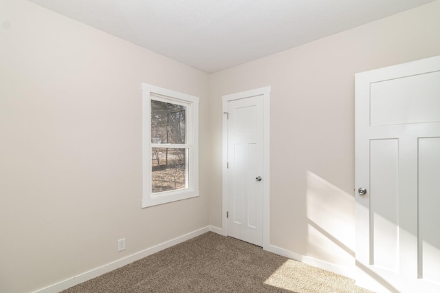 view of carpeted spare room