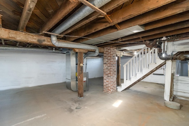 basement featuring heating unit