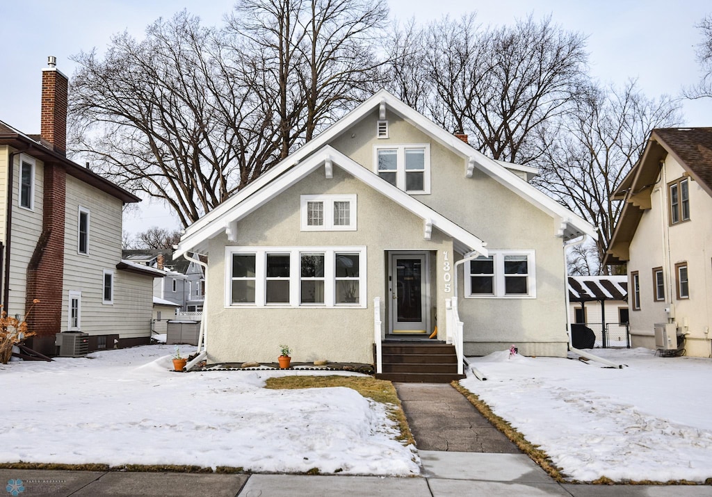 view of front of home featuring central air condition unit