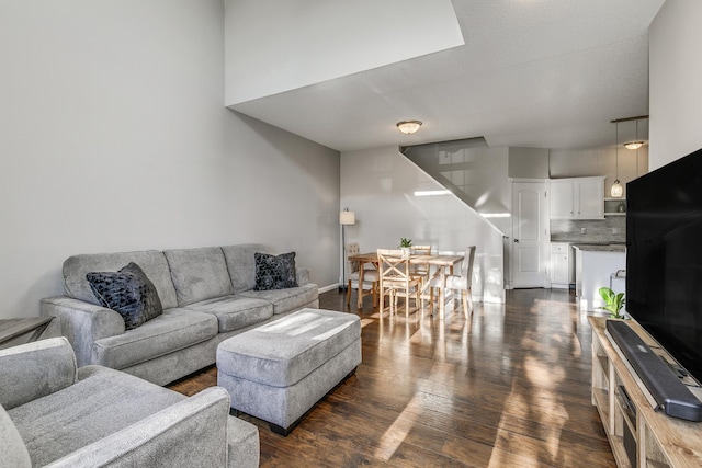 living room featuring dark hardwood / wood-style flooring