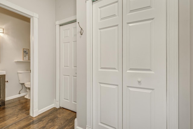 hallway featuring dark hardwood / wood-style floors