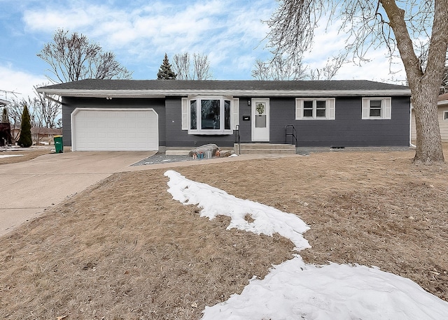 ranch-style home featuring a garage