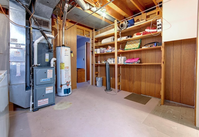 basement with heating unit and water heater