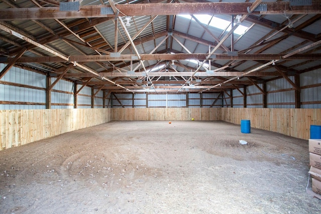 miscellaneous room with lofted ceiling