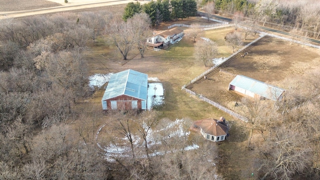 birds eye view of property with a rural view