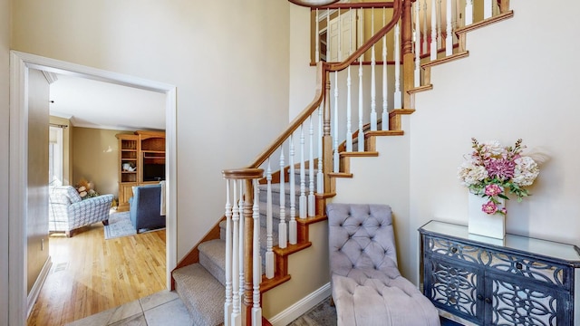 stairway with wood-type flooring