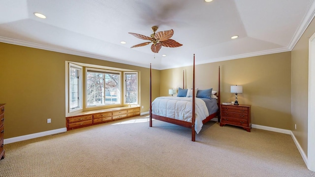 carpeted bedroom featuring a raised ceiling and ornamental molding