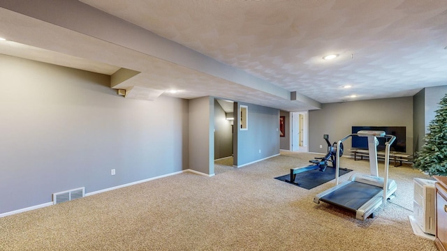 workout room with light carpet