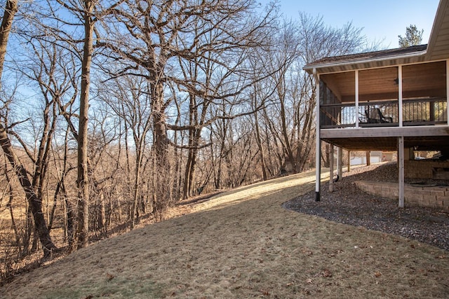 view of yard with a wooden deck