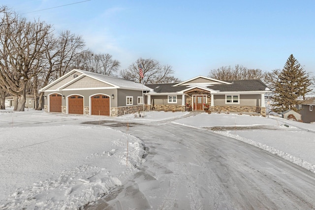 single story home with a garage