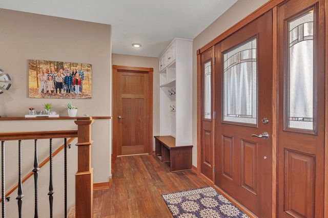 entrance foyer with dark hardwood / wood-style floors