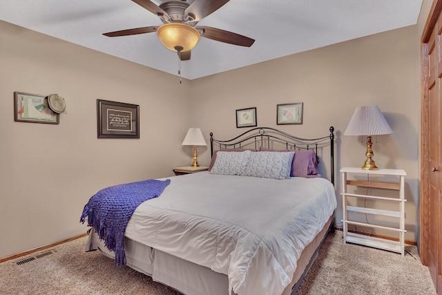 bedroom featuring ceiling fan and carpet flooring