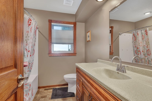 full bathroom with shower / bathtub combination with curtain, vanity, and toilet