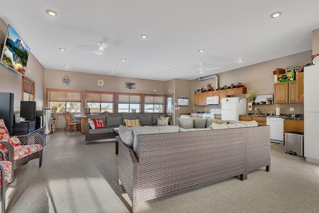 living room featuring ceiling fan